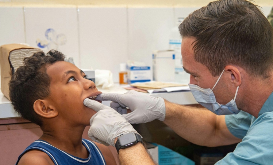 Family dentist in Avon, IN examining a child during a dental checkup